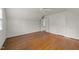 Large bedroom with natural light, hardwood floors and baseboard heating looks clean and well-maintained at 119 Montgomery St, Raleigh, NC 27607
