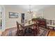 Elegant dining room with chandelier and classic wood furniture at 119 Montgomery St, Raleigh, NC 27607