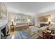 Bright living room showcasing fireplace and hardwood floors at 119 Montgomery St, Raleigh, NC 27607