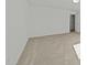 An empty bedroom with neutral carpet, a closet in the background, and off-white walls at 1209 Huffington Oak Dr, Willow Springs, NC 27592
