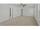 An airy bedroom featuring a ceiling fan, plush carpeting, and a welcoming ambiance at 1209 Huffington Oak Dr, Willow Springs, NC 27592