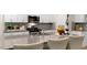 Well-equipped kitchen featuring granite countertops, stainless steel appliances, and ample cabinet space at 1216 Pavo Path, Wendell, NC 27591