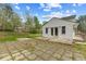 Expansive backyard featuring a combination of wood deck, patio, and well-maintained lawn at 124 Maluli Dr, Oxford, NC 27565