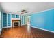 Comfortable living room with a cozy fireplace and ample natural light at 124 Maluli Dr, Oxford, NC 27565
