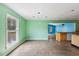 Bright living room with large windows and hardwood-style flooring at 124 Maluli Dr, Oxford, NC 27565
