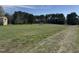 Sprawling backyard with a small building nestled in the background at 1278 Valley Ct, Zebulon, NC 27597