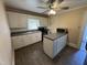 This traditional kitchen features an island, laminate countertops, and essential appliances at 1278 Valley Ct, Zebulon, NC 27597