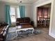 Comfortable living room with plush seating, area rug, and plenty of light at 1278 Valley Ct, Zebulon, NC 27597