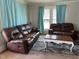 Comfortable living room with plush seating, rug, and plenty of light at 1278 Valley Ct, Zebulon, NC 27597