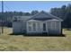 Rear view of home, showing the back entrance and home exterior at 1278 Valley Ct, Zebulon, NC 27597