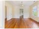 Elegant dining room with hardwood floors, classic trim, and chandelier at 1308 Wake Forest Rd, Raleigh, NC 27604