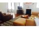 Inviting living room with a fireplace, comfortable seating, and an open floor plan at 1308 Wake Forest Rd, Raleigh, NC 27604