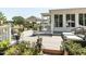 Outdoor deck with seating, potted plants, and views of the yard, perfect for relaxing and entertaining at 132 Crystal Pl, Benson, NC 27504