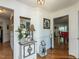 Inviting hallway with hardwood floors and decorative accents to greet your guests at 132 Crystal Pl, Benson, NC 27504