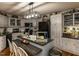 Well-lit kitchen features an island with bar seating and updated appliances at 132 Crystal Pl, Benson, NC 27504