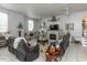 Spacious living room featuring comfortable seating, a fireplace, and an open, airy layout at 132 Crystal Pl, Benson, NC 27504