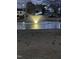 Picturesque pond featuring a central fountain, enhancing the community's serene and appealing atmosphere at 132 Crystal Pl, Benson, NC 27504