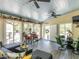Cozy sunroom with lots of natural light and comfortable seating at 132 Crystal Pl, Benson, NC 27504