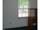 Office space with a white wall and window for natural lighting at 136 Scramble Rd, Erwin, NC 28339