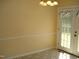 Bright dining area with neutral paint and view of french doors at 136 Scramble Rd, Erwin, NC 28339