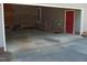Garage's interior featuring a ramp, steps, and a door, offering accessibility and convenience at 136 Scramble Rd, Erwin, NC 28339