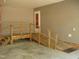 Garage featuring an accessibility ramp and stairs, providing easy access to the interior at 136 Scramble Rd, Erwin, NC 28339