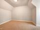 Attic bedroom featuring vaulted ceiling and neutral carpeting at 145 Brannigan Pl, Cary, NC 27511