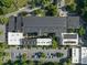Aerial view of commercial building with parking and mature landscaping at 1535 Caraleigh Mills Ct # 104, Raleigh, NC 27603