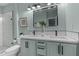 Chic bathroom with double vanity, stylish lighting, and modern fixtures at 1535 Caraleigh Mills Ct # 104, Raleigh, NC 27603
