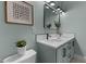 Elegant bathroom features a double sink vanity and stylish decor at 1535 Caraleigh Mills Ct # 104, Raleigh, NC 27603