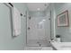 Modern bathroom with a glass-enclosed shower and contemporary fixtures at 1535 Caraleigh Mills Ct # 104, Raleigh, NC 27603