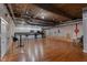 Common room with kitchenette, exposed brick and a large open area for gatherings at 1535 Caraleigh Mills Ct # 104, Raleigh, NC 27603
