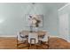 Bright dining room featuring hardwood floors and space for hosting Gathering and friends at 1535 Caraleigh Mills Ct # 104, Raleigh, NC 27603