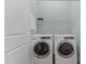 Functional laundry room features modern washer and dryer units at 1535 Caraleigh Mills Ct # 104, Raleigh, NC 27603