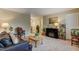 Inviting living room with fireplace, comfortable sofa, and bright decor that creates a relaxing atmosphere at 1700 W Front St # 36 D, Burlington, NC 27215