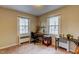 Well-lit office space with neutral walls, carpeted floors, and multiple windows for natural light at 1700 W Front St # 36 D, Burlington, NC 27215