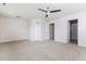 This bedroom is spacious and bright and has a ceiling fan, closet, and access to the bathroom at 1817 Shady Oaks Dr, Wendell, NC 27591