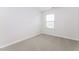 This is a bedroom with neutral walls, one window, and neutral carpeting at 1817 Shady Oaks Dr, Wendell, NC 27591