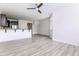 Open-concept living space with modern flooring and ample natural light at 1817 Shady Oaks Dr, Wendell, NC 27591