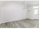 Open-concept room filled with natural light, perfect for a living room or dining area at 1817 Shady Oaks Dr, Wendell, NC 27591