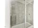 The shower has gray tiling, a showerhead, and two shelves for storage at 1817 Shady Oaks Dr, Wendell, NC 27591