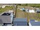 Aerial view showing the backyard, roof, and community properties at 1950 Menet St, Apex, NC 27502