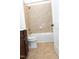 Bathroom with tiled shower and bath at 1950 Menet St, Apex, NC 27502