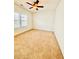 Bedroom featuring a ceiling fan and neutral carpet at 1950 Menet St, Apex, NC 27502