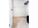 Walk-in closet with corner shelving and carpet, offering ample storage space and organization options at 1950 Menet St, Apex, NC 27502