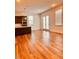Open-concept living area featuring hardwood floors and plenty of natural light at 1950 Menet St, Apex, NC 27502