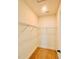 Spacious walk-in closet with ample shelving and storage options at 1950 Menet St, Apex, NC 27502