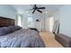 Comfortable bedroom features large bed, ample space, with access to the bathroom at 212 Mickleson Ridge Dr, Raleigh, NC 27603