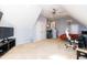 Spacious bonus room with ample area for entertaining, gaming and recreation at 212 Mickleson Ridge Dr, Raleigh, NC 27603