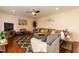 Inviting living room featuring hardwood floors, a large sectional sofa, and a cozy rug at 212 Mickleson Ridge Dr, Raleigh, NC 27603